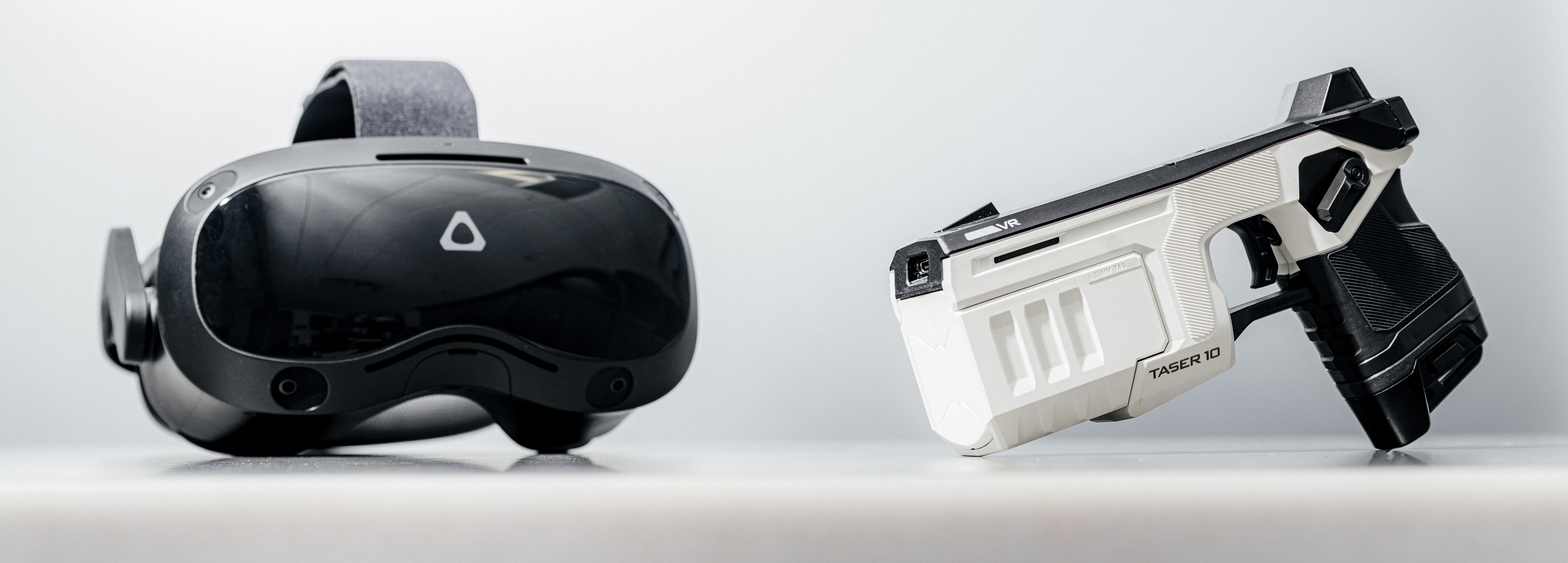 The VIVE Focus headset and TASER 10 VR Controller used for Axon virtual reality training